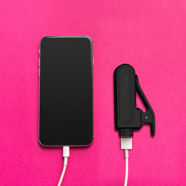 The BrightFlex's battery bank connected to a smartphone.